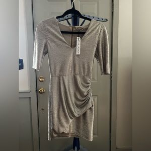 Alice and Olivia dress in gold. Size 2 NWT
